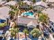 Aerial view of community featuring mature landscaping, multiple buildings, walking paths and a community pool at 3425 E Russell Rd # 240, Las Vegas, NV 89120