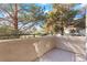 Outdoor balcony offering privacy and treetop views on a sunny day at 3425 E Russell Rd # 240, Las Vegas, NV 89120