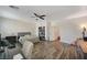 Bright and spacious bedroom with wood floors and an attached closet at 4727 Sweeping Glen St, Las Vegas, NV 89129