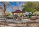 The neighborhood park features a gazebo, playground, green space and barbecue grill at 4727 Sweeping Glen St, Las Vegas, NV 89129