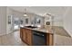 Kitchen island with granite countertop and stainless steel appliances at 5484 Oatfield St, North Las Vegas, NV 89081