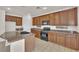 Well-equipped kitchen with granite countertops and island at 5484 Oatfield St, North Las Vegas, NV 89081