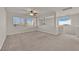 Spacious loft area with high ceilings and large windows at 5484 Oatfield St, North Las Vegas, NV 89081