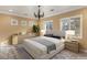 Bedroom with neutral decor and ample natural light at 62 Golf Estates Dr, Las Vegas, NV 89141