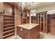 Custom walk-in closet with ample shelving and hanging space at 62 Golf Estates Dr, Las Vegas, NV 89141