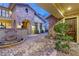 Courtyard entry with fountain and archway at 62 Golf Estates Dr, Las Vegas, NV 89141