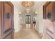 Elegant entry with double doors and tile floors at 62 Golf Estates Dr, Las Vegas, NV 89141