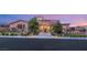 Elegant stone home with landscaped entryway at 62 Golf Estates Dr, Las Vegas, NV 89141