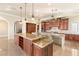 Spacious kitchen with large island, custom cabinetry, and granite countertops at 62 Golf Estates Dr, Las Vegas, NV 89141