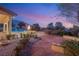 Landscaped pathway with fire pit and seating area at 62 Golf Estates Dr, Las Vegas, NV 89141