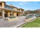 Covered patio with fountain and access to pool area at 62 Golf Estates Dr, Las Vegas, NV 89141