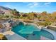 Large pool with water features and scenic view at 62 Golf Estates Dr, Las Vegas, NV 89141