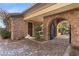 Ornate iron gate and stone walkway at 62 Golf Estates Dr, Las Vegas, NV 89141