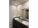 Bathroom showcasing a double sink with granite countertop at 7544 Pink Mimosa Ave, Las Vegas, NV 89113