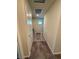 Carpeted hallway with safety gate at top of stairs at 7544 Pink Mimosa Ave, Las Vegas, NV 89113