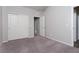 Spacious bedroom with double closets and neutral carpeting at 9936 Coyote Echo Ct, Las Vegas, NV 89166