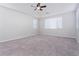 Large bedroom featuring a ceiling fan and ample natural light at 9936 Coyote Echo Ct, Las Vegas, NV 89166