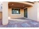 Covered patio with brick pavers and lighting at 9936 Coyote Echo Ct, Las Vegas, NV 89166