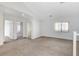 Loft area with carpet flooring and natural light from a window at 4788 Frankfurt Ct, Las Vegas, NV 89147