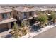 Two story house with brown roof and attached garage at 712 Rogue Wave St, Las Vegas, NV 89138