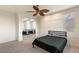 Comfortable bedroom with mirrored closet doors and wainscoting at 1282 Calcione Dr, Henderson, NV 89011