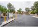 Welcoming entrance to the Rancho Lake Condominiums with well-maintained landscaping at 2151 Hussium Hills St # 207, Las Vegas, NV 89108