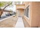 Inviting front entrance with covered porch and decorative door at 2151 Hussium Hills St # 207, Las Vegas, NV 89108