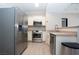 Well-lit kitchen featuring stainless steel appliances and plenty of counter space at 2151 Hussium Hills St # 207, Las Vegas, NV 89108