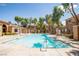 Inviting community pool with refreshing clear water and a sun-soaked pool deck at 2151 Hussium Hills St # 207, Las Vegas, NV 89108