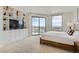 King bed, built-in shelving, and city views from this bedroom at 322 Karen Ave # 2007, Las Vegas, NV 89109