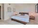 Spacious bedroom with plush bed and city views at 322 Karen Ave # 2007, Las Vegas, NV 89109