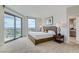 Bedroom with a king-size bed and access to balcony at 322 Karen Ave # 2007, Las Vegas, NV 89109