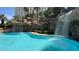 Resort-style pool with waterfall feature at 322 Karen Ave # 2007, Las Vegas, NV 89109