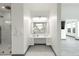 Elegant bathroom with modern vanity and large mirror at 31 Vista Outlook St, Henderson, NV 89011