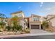 Modern two-story home with contemporary design and landscaping at 31 Vista Outlook St, Henderson, NV 89011