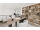 Stylish home office with built-in shelving and a large desk at 31 Vista Outlook St, Henderson, NV 89011