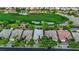 Golf course community with several homes visible from above at 4660 Fiore Bella Blvd, Las Vegas, NV 89135