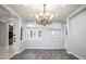 Elegant dining room with hardwood floors and a chandelier at 5527 Breecher Ave, Las Vegas, NV 89131