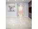 Bright entryway with tile flooring, double doors, and elegant chandeliers at 5527 Breecher Ave, Las Vegas, NV 89131