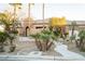 Stunning curb appeal with palm trees and stone accents at 5527 Breecher Ave, Las Vegas, NV 89131