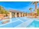 Backyard guest house with blue patio and pool access at 5527 Breecher Ave, Las Vegas, NV 89131