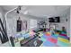 Fully equipped home gym with various exercise machines at 5527 Breecher Ave, Las Vegas, NV 89131