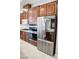 Stainless steel refrigerator and double oven with kitchen island at 5527 Breecher Ave, Las Vegas, NV 89131