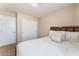 Comfortable bedroom with a queen-size bed and sliding doors at 9017 Exultation Ct, Las Vegas, NV 89149