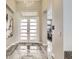 Bright and spacious entryway with modern double doors and elegant flooring at 4160 W Ford Ave, Las Vegas, NV 89139