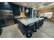 Modern kitchen with blue marble island and stainless steel appliances at 4160 W Ford Ave, Las Vegas, NV 89139