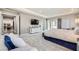 Spacious main bedroom with plush carpeting, a sitting area and access to the backyard at 4160 W Ford Ave, Las Vegas, NV 89139