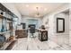 Bright home office with built-in shelving and large desk at 4160 W Ford Ave, Las Vegas, NV 89139