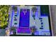 Top-down view of a luxurious pool with surrounding lounge areas and palm trees at 4160 W Ford Ave, Las Vegas, NV 89139