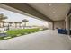 Covered patio overlooking a large pool and grassy backyard at 4160 W Ford Ave, Las Vegas, NV 89139
